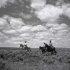 Between Grass and Sky: Rhythms of a Cowboy Poem